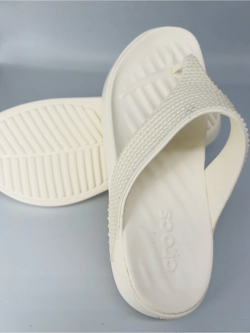 Crocs women’s getaway gems flip flops- chalk